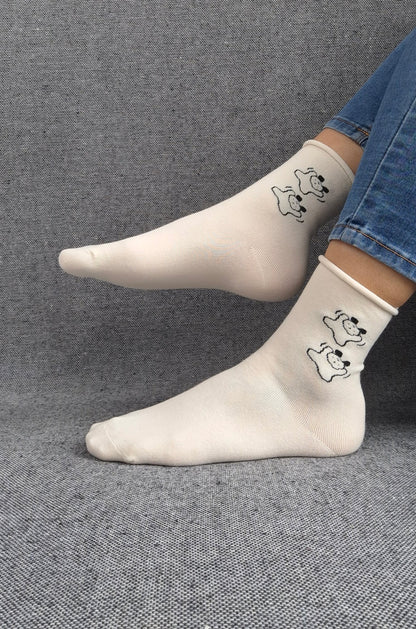 Paire de chaussettes blanches en coton à motifs deux petits chiens noirs