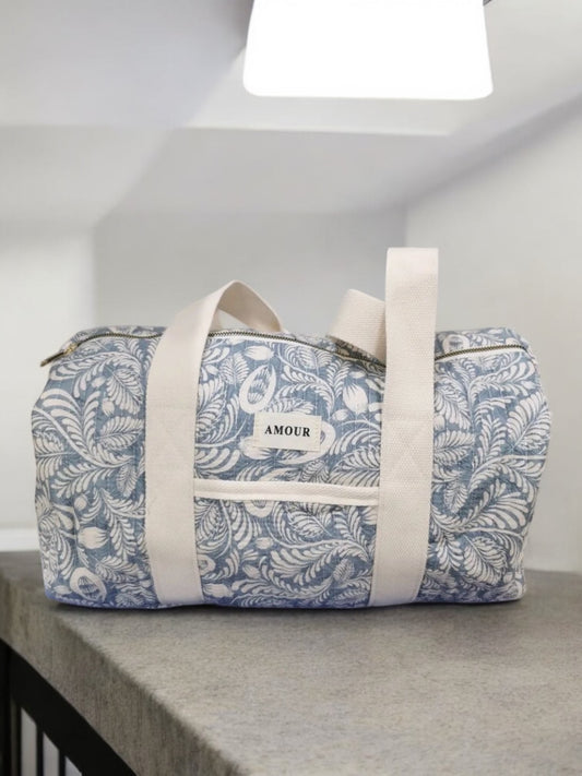 Nouveautés - Sac polochon bleu en coton imprimé feuilles blanches