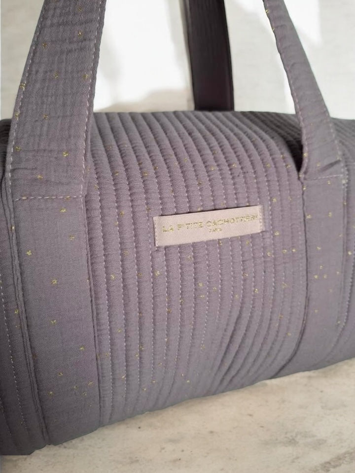 Nouveautés - Sac polochon en coton matelassé violet parme à pois dorés 'La Ptite Cachotiere'