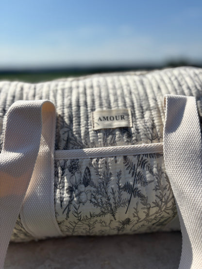 Sac polochon blanc en coton liberty fleuri noir