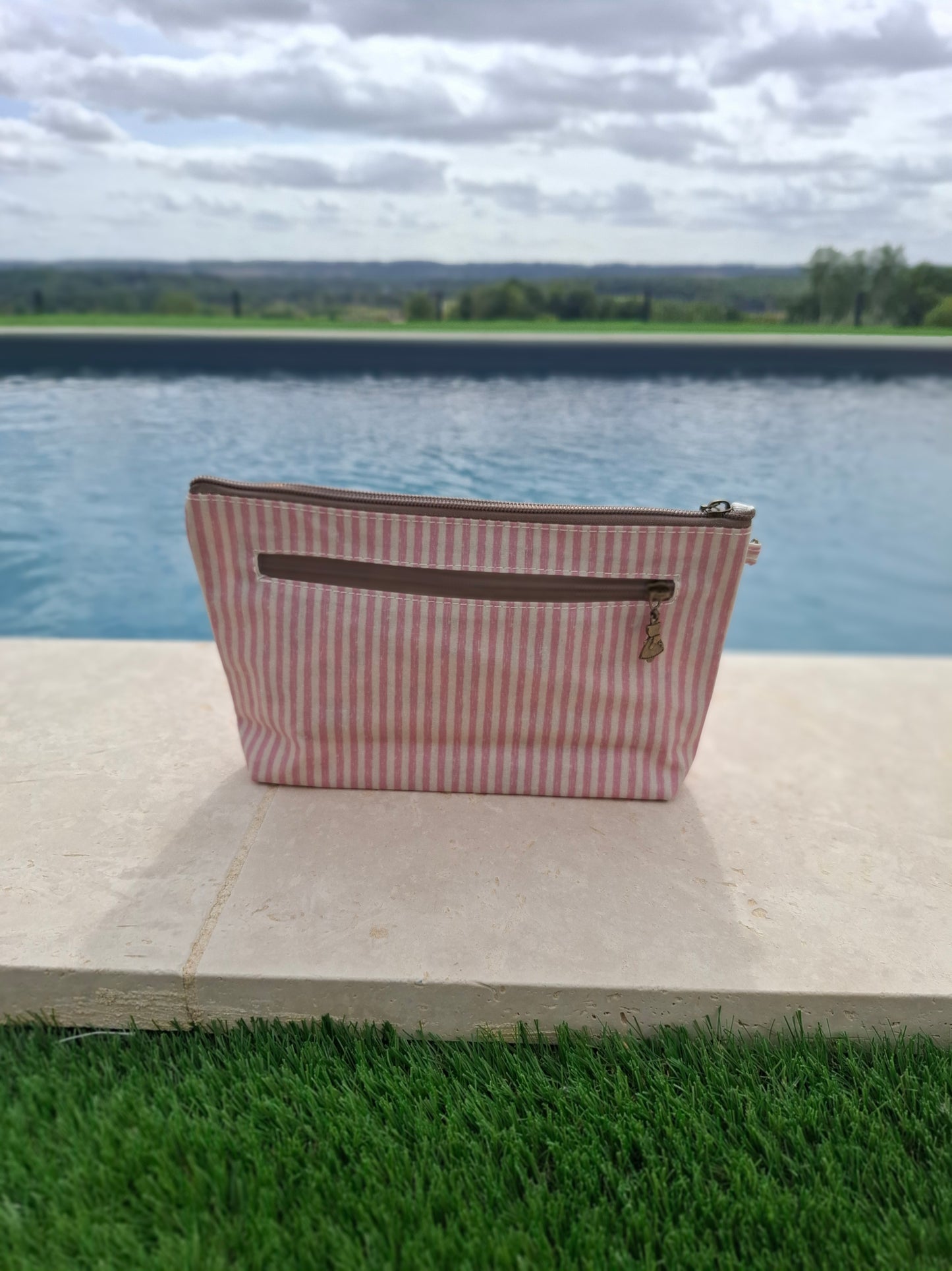 Pochette trousse en tissu imperméabilisé rose et blanc