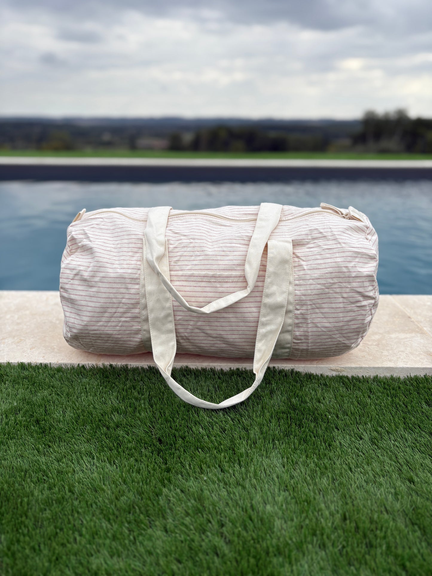 Sac polochon week end de voyage en coton léger rayé beige rouge rose