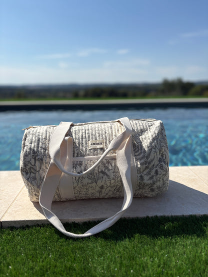 Sac polochon blanc en coton liberty fleuri noir