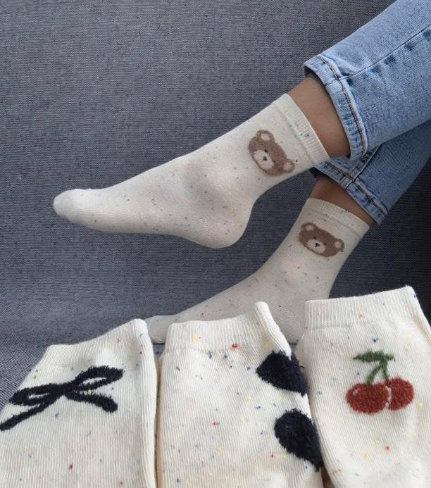 Paire de chaussettes blanches en coton à motif ours