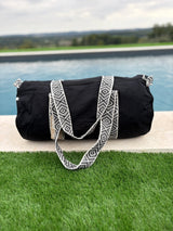 Bolsa de lona de algodón negra con asas de motivos geométricos en blanco y negro