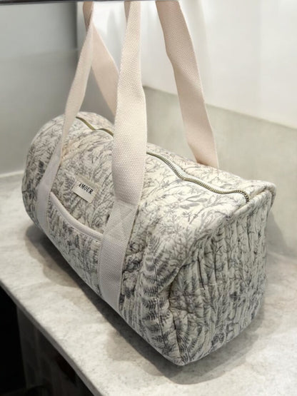 Sac polochon blanc en coton liberty fleuri noir
