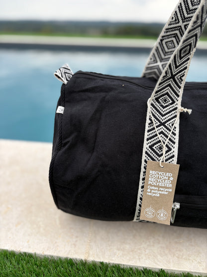 Sac polochon en coton tissu noir avec poignées motifs géométriques en noir et blanc
