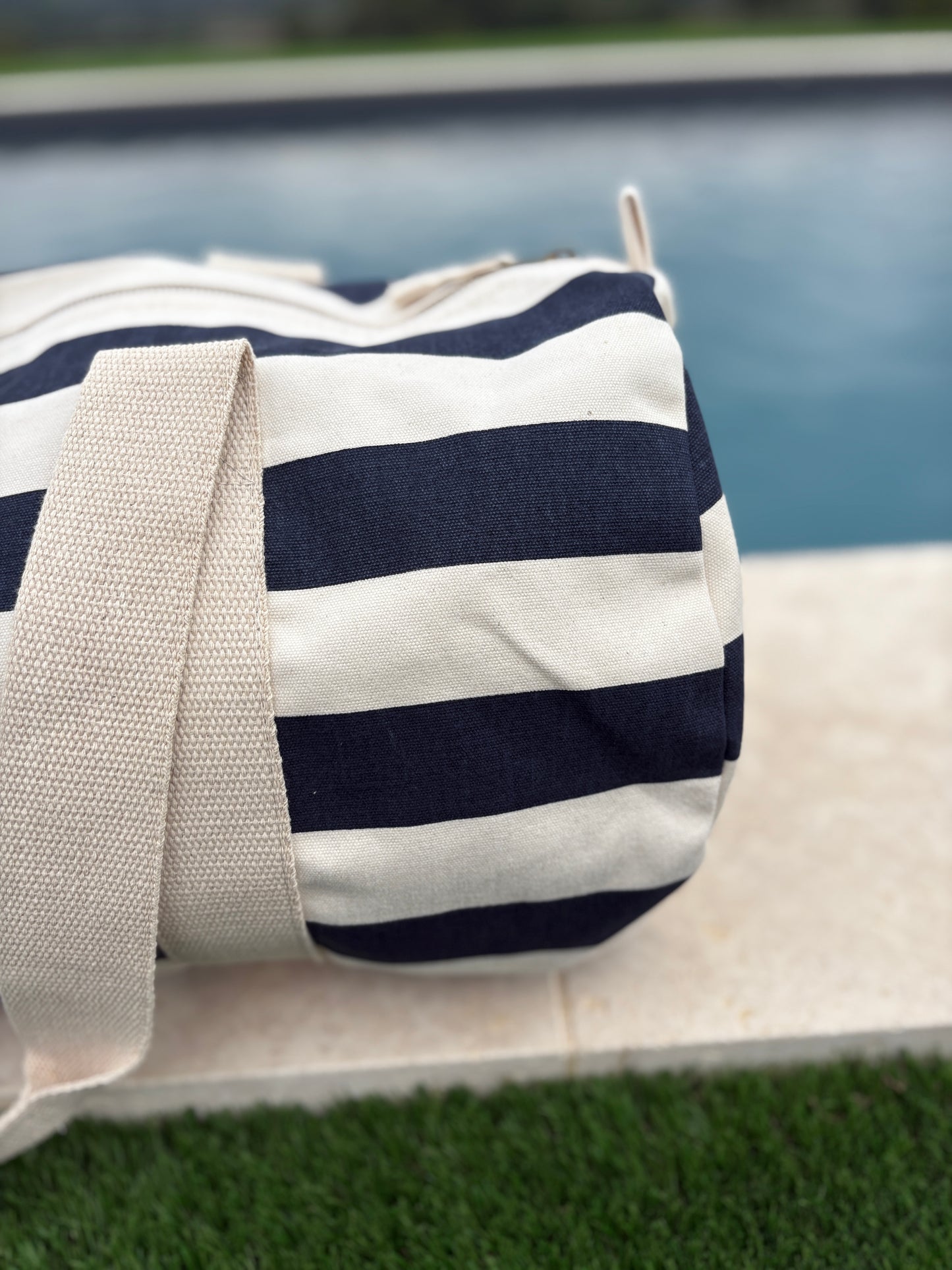 Sac polochon en coton rayé bleu marine et blanc