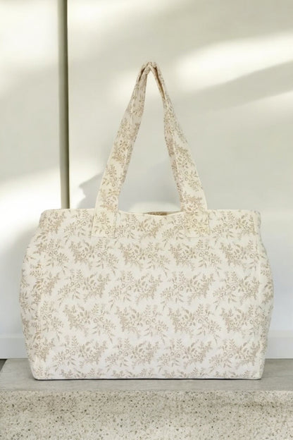 Sac week-end de voyage polochon écru coton design imprimé avec un motif floral taupe