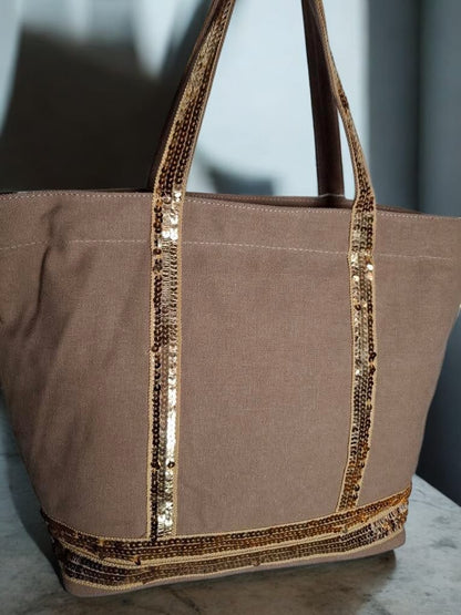 Sac à main style cabas porté main en tissu taupe avec sequins dorés