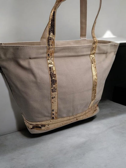 Sac à main style cabas porté main en tissu beige avec sequins dorés