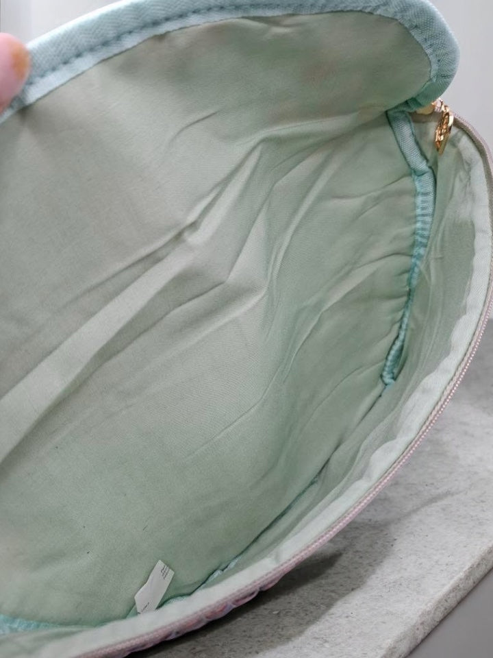 Nouveautés - Sac banane en coton liberty fleuri vert d’eau « La Ptite cachottière »