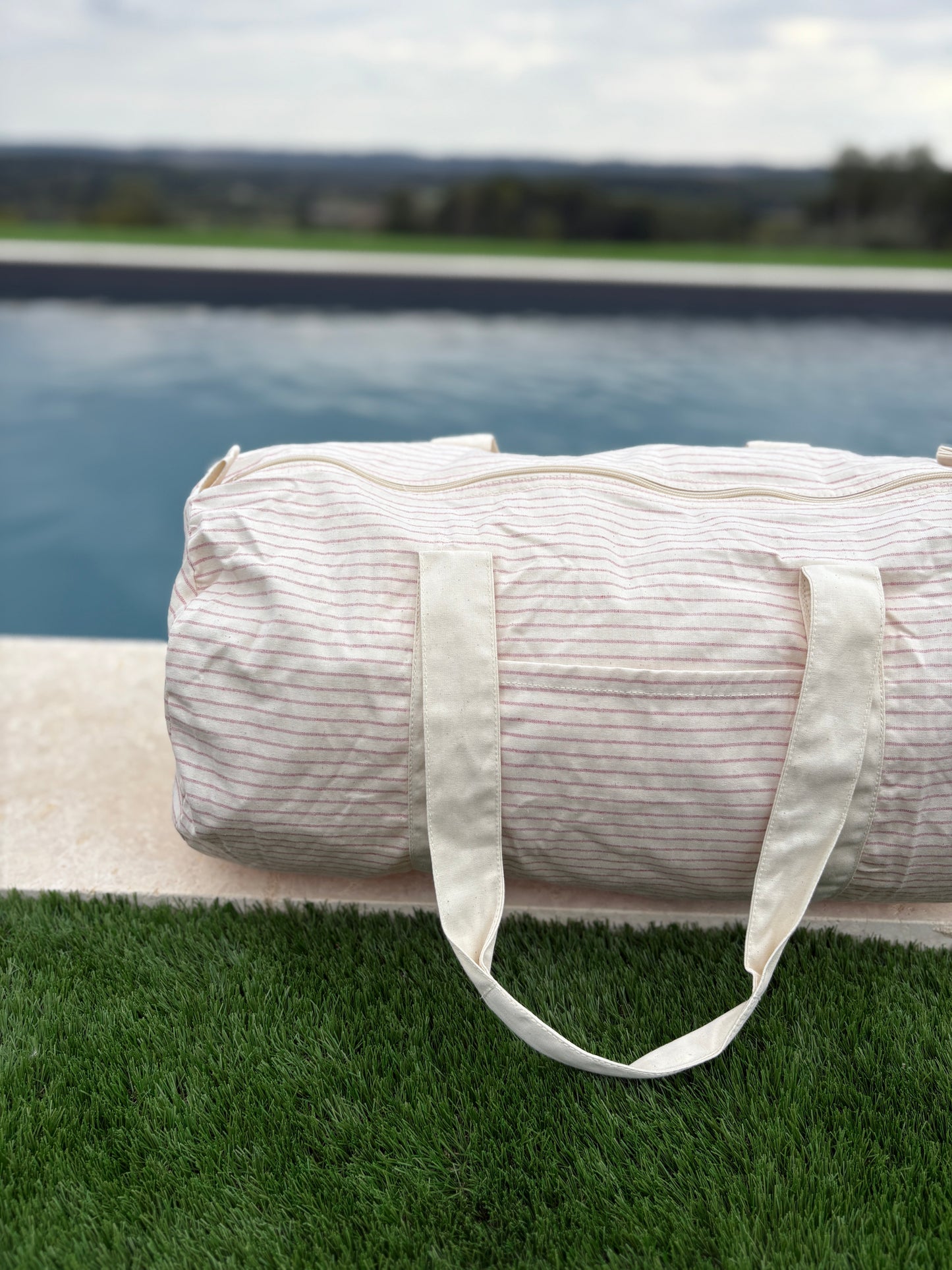 Sac polochon week end de voyage en coton léger rayé beige rouge rose
