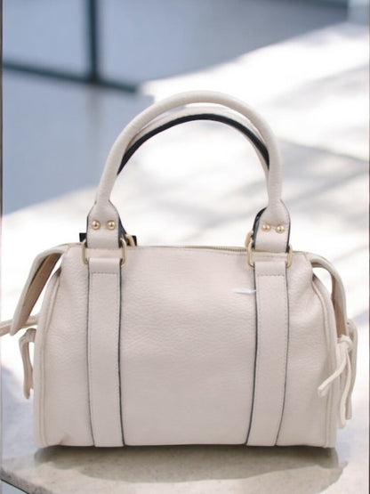 Sac à main en simili cuir beige avec détails métalliques dorés