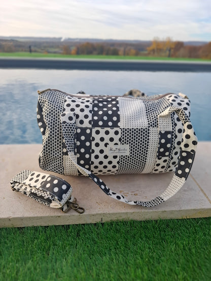 Sac polochon week end de voyage en tissu coton patchwork motifs à pois noir et blanc