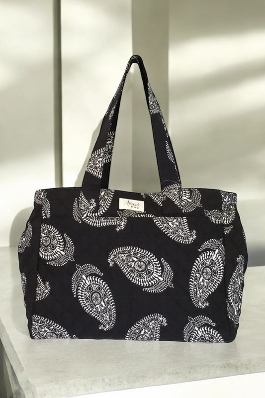 Sac week-end de voyage polochon noir coton design imprimé avec un motif paisley blanc