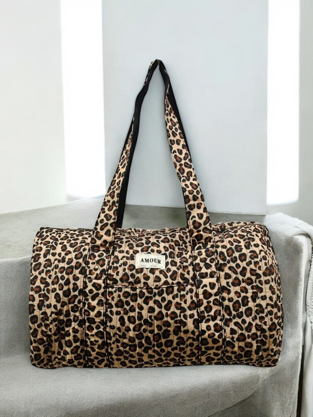 Sac polochon en tissu coton matelassé imprimé léopard beige marron