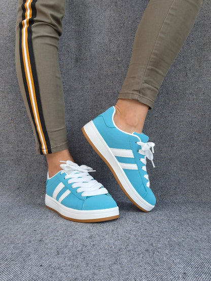 Chaussures baskets basses bleu turquoise avec bandes blanches style campus