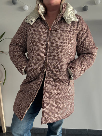 Woman wearing Laura Jo patterned raincoat from Le Petit Placard, modern indoor setting