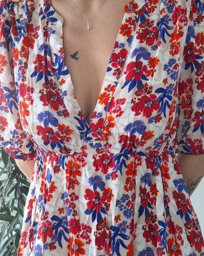 Floral print dress with red, purple, and orange flowers from Le Petit Placard