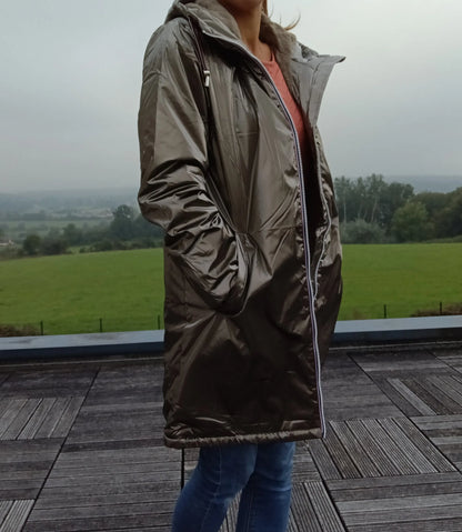 Woman wearing bronze Laura Jo raincoat outdoors, Le Petit Placard trendy waterproof jacket