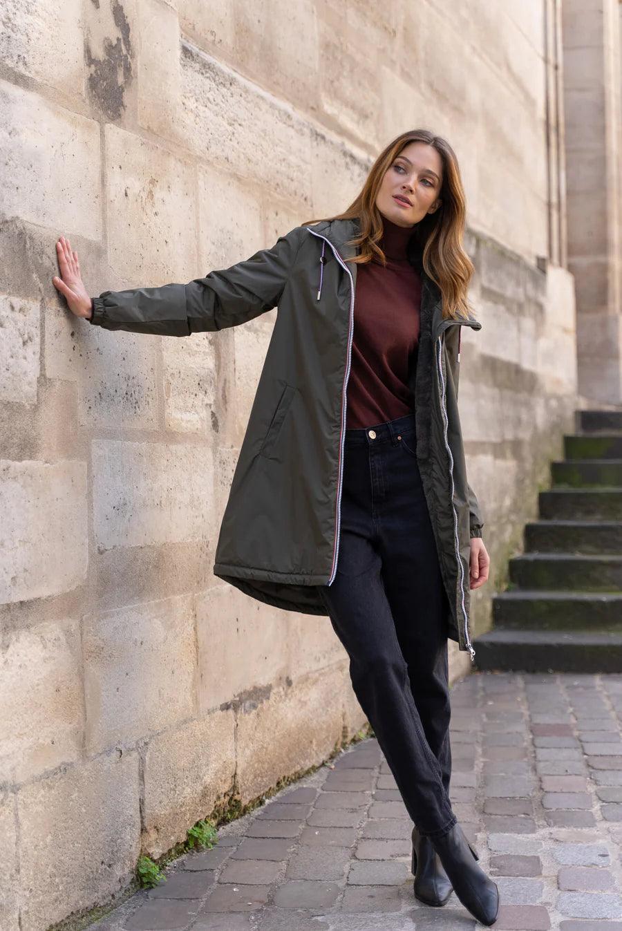 Woman wearing Laura Jo khaki raincoat with faux fur detail, casual fall fashion, Le Petit Placard
