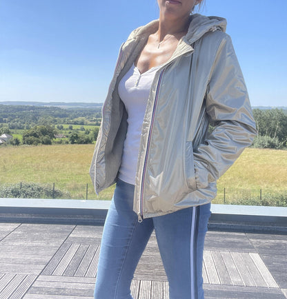 Woman wearing Laura Jo short waterproof fur-lined jacket outdoors, Le Petit Placard