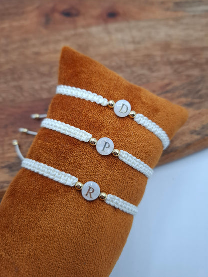 White braided initial bracelets with gold beads on velvet display, Le Petit Placard accessories