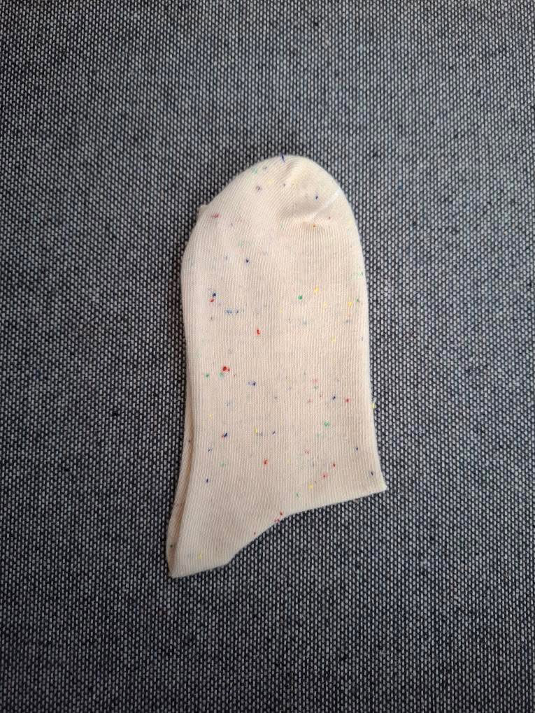 Paire de chaussettes beige en coton à motif noeud Le Petit Placard