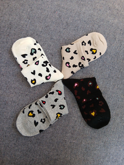 Paire de chaussettes noires en coton à motifs coeurs colorés Le Petit Placard