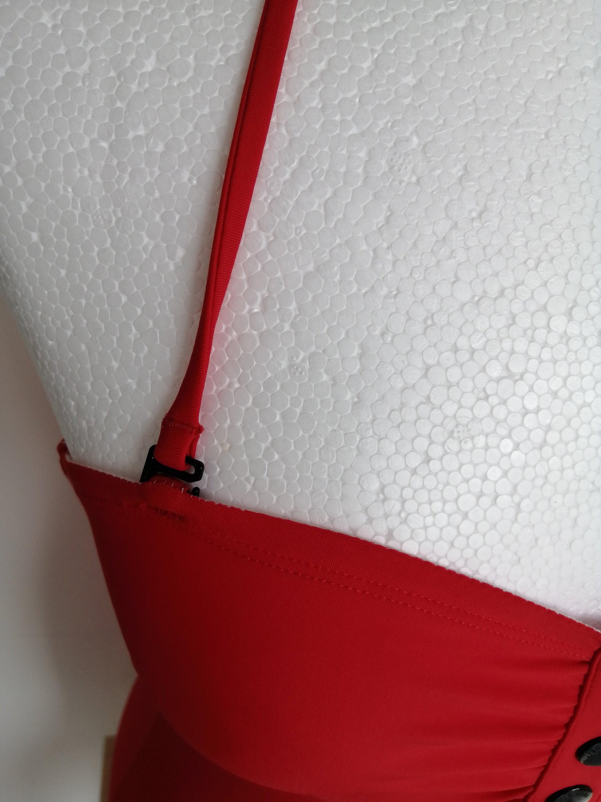 Red one-piece swimsuit with removable strap on mannequin, Le Petit Placard