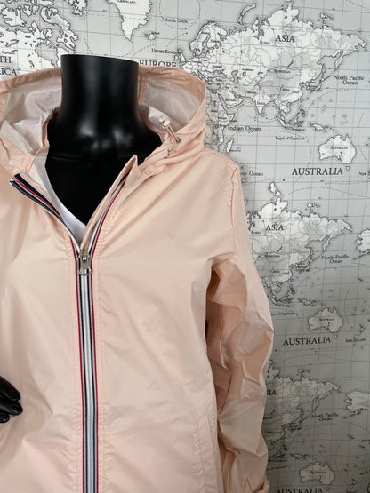 Laura Jo nude pink long raincoat on mannequin, Le Petit Placard, world map background
