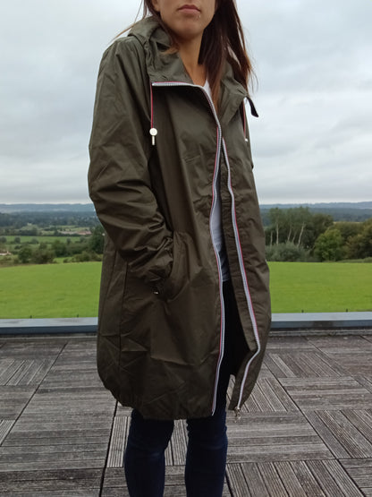 Woman wearing an olive green Laura Jo raincoat outdoors, Le Petit Placard fashion