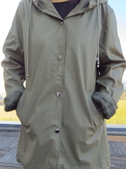 Long khaki waterproof hooded coat with faux fur lining, Le Petit Placard outdoor fashion