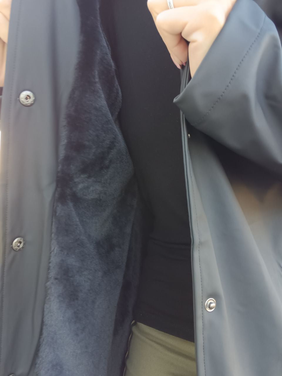 Long black waterproof coat with soft fleece lining from Le Petit Placard