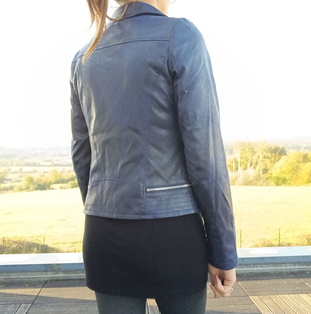 Woman in blue Laura Jo jacket and black skirt outdoors, Le Petit Placard fashion