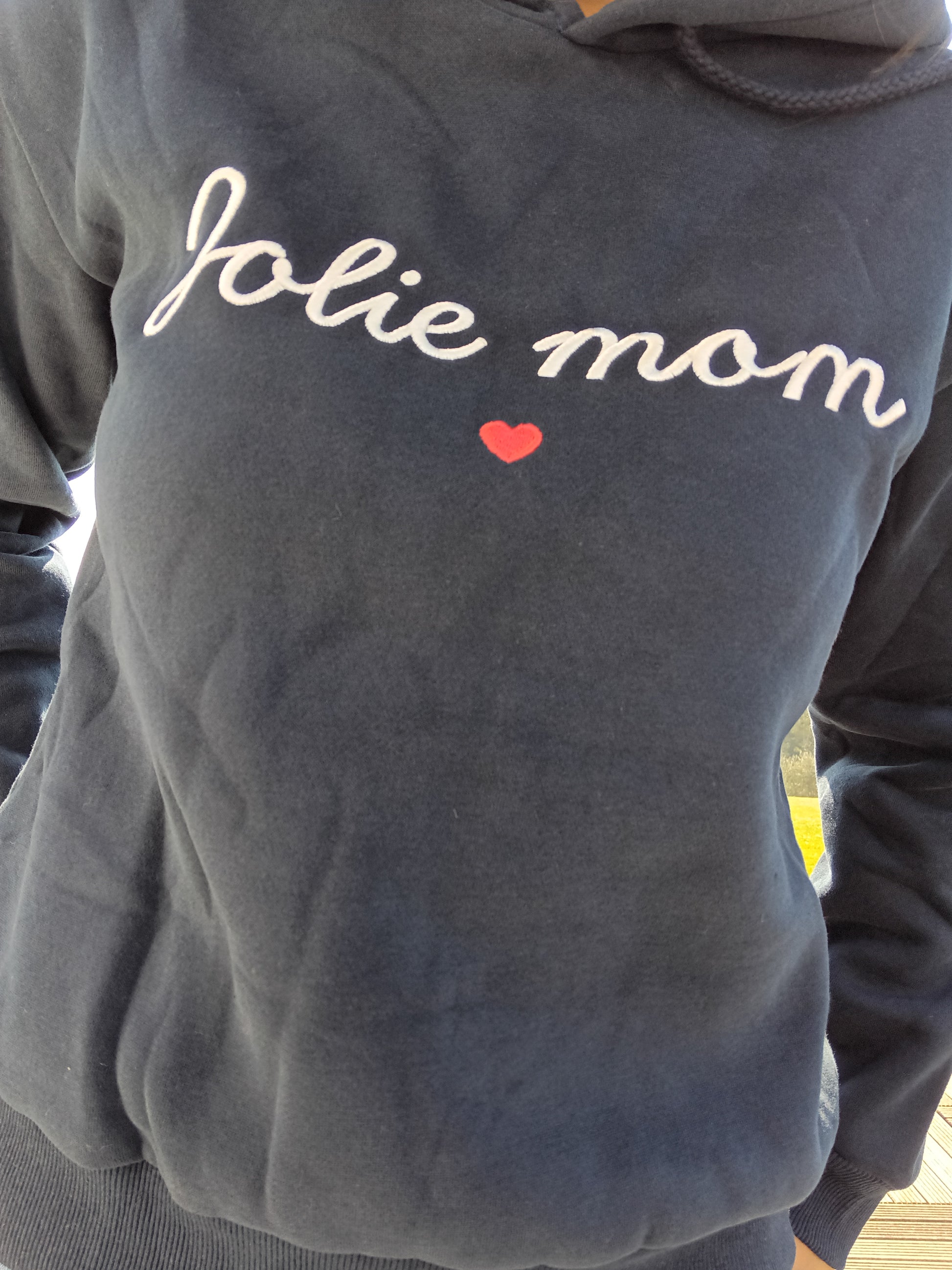 Navy blue sweatshirt with 'Jolie Mom' and red heart embroidery from Le Petit Placard