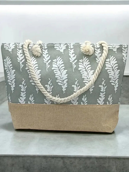 Sac à main de plage porté à l’épaule gris motifs plumes Le Petit Placard