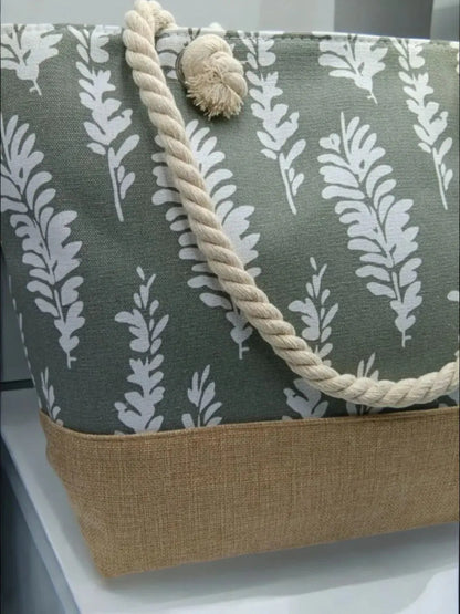 Sac à main de plage porté à l’épaule gris motifs plumes Le Petit Placard