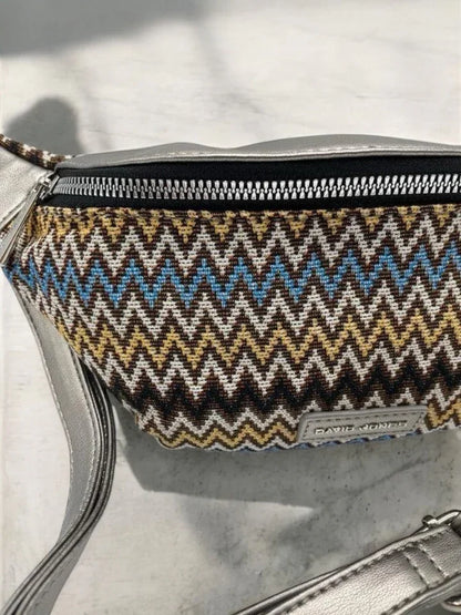 Colorful zigzag patterned David Jones belt bag with silver strap on marble surface, Le Petit Placard