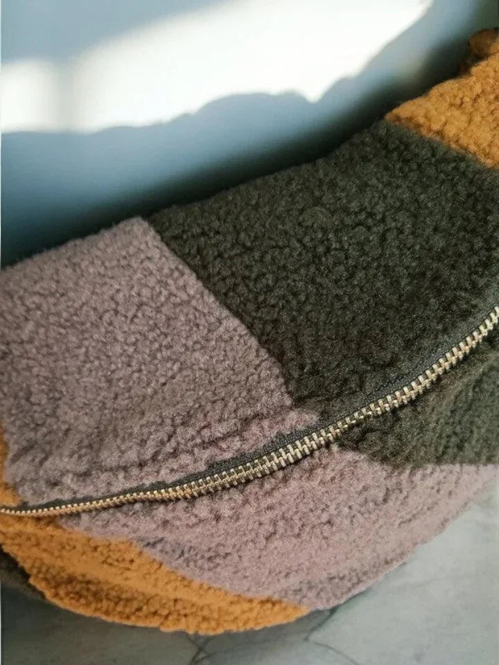 Color block sherpa belt bag from Le Petit Placard with soft texture and zipper detail