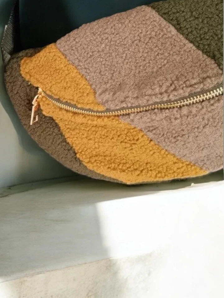 Colorblock sherpa fanny pack with zipper, trendy accessory from Le Petit Placard