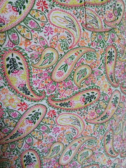 Close-up of pink and green paisley pattern bag, Escandelle, Le Petit Placard accessory