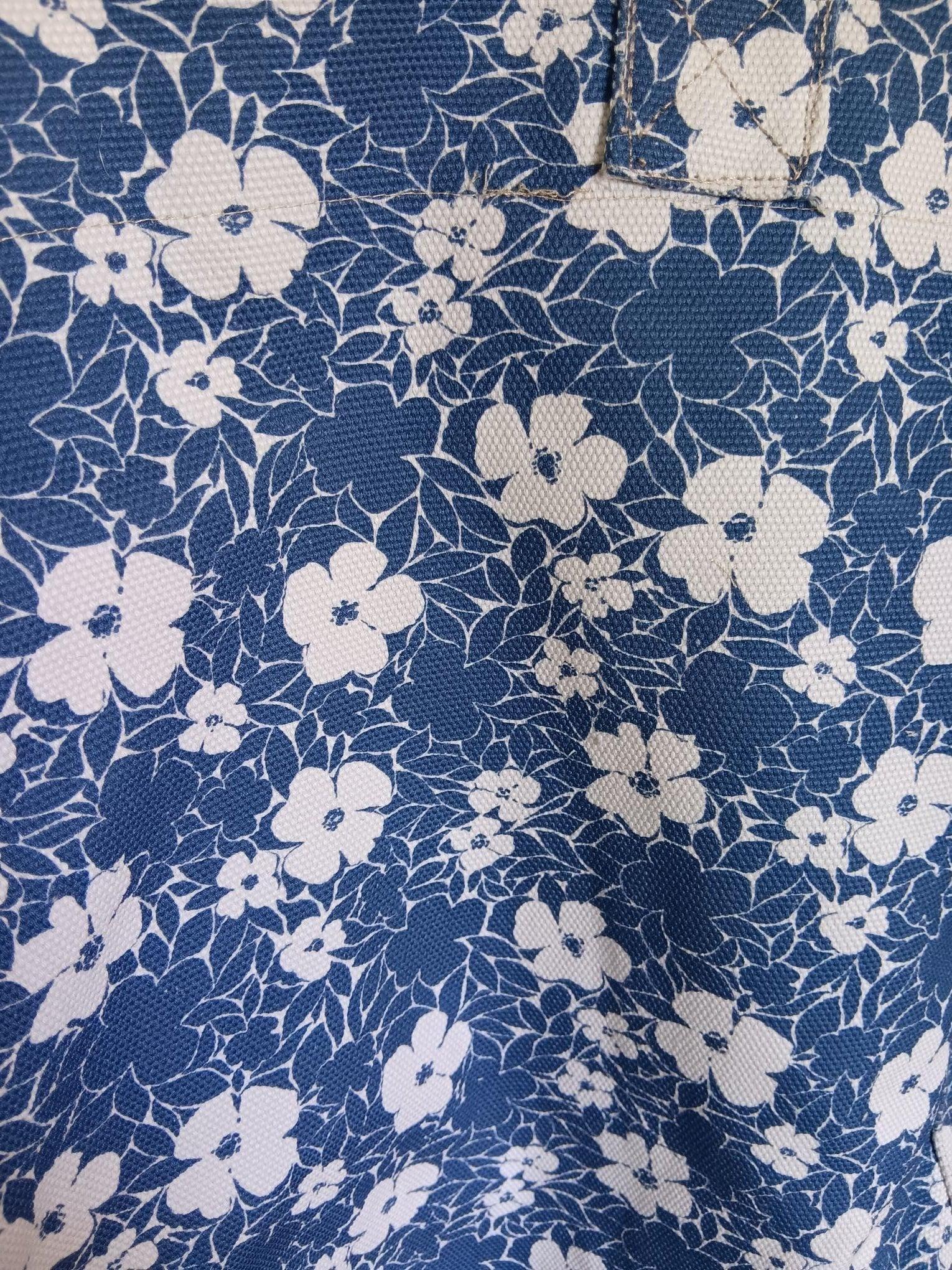 Blue and white floral fabric with textured material, trendy accessory style from Le Petit Placard