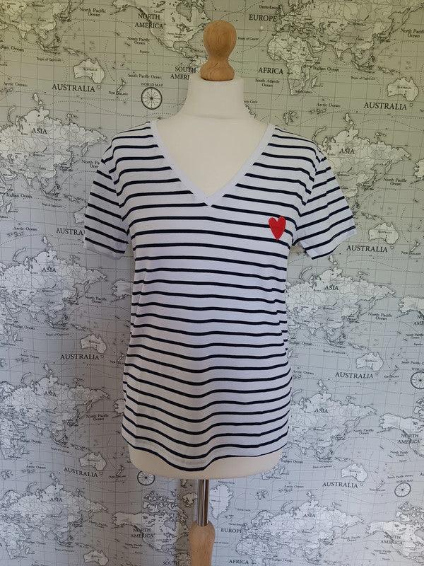 Blue striped t-shirt with red heart patch, Le Petit Placard fashion, on mannequin.