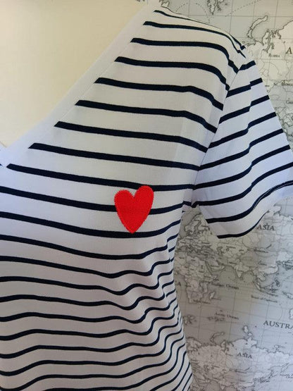 Navy striped white t-shirt with red heart patch from Le Petit Placard, close-up view