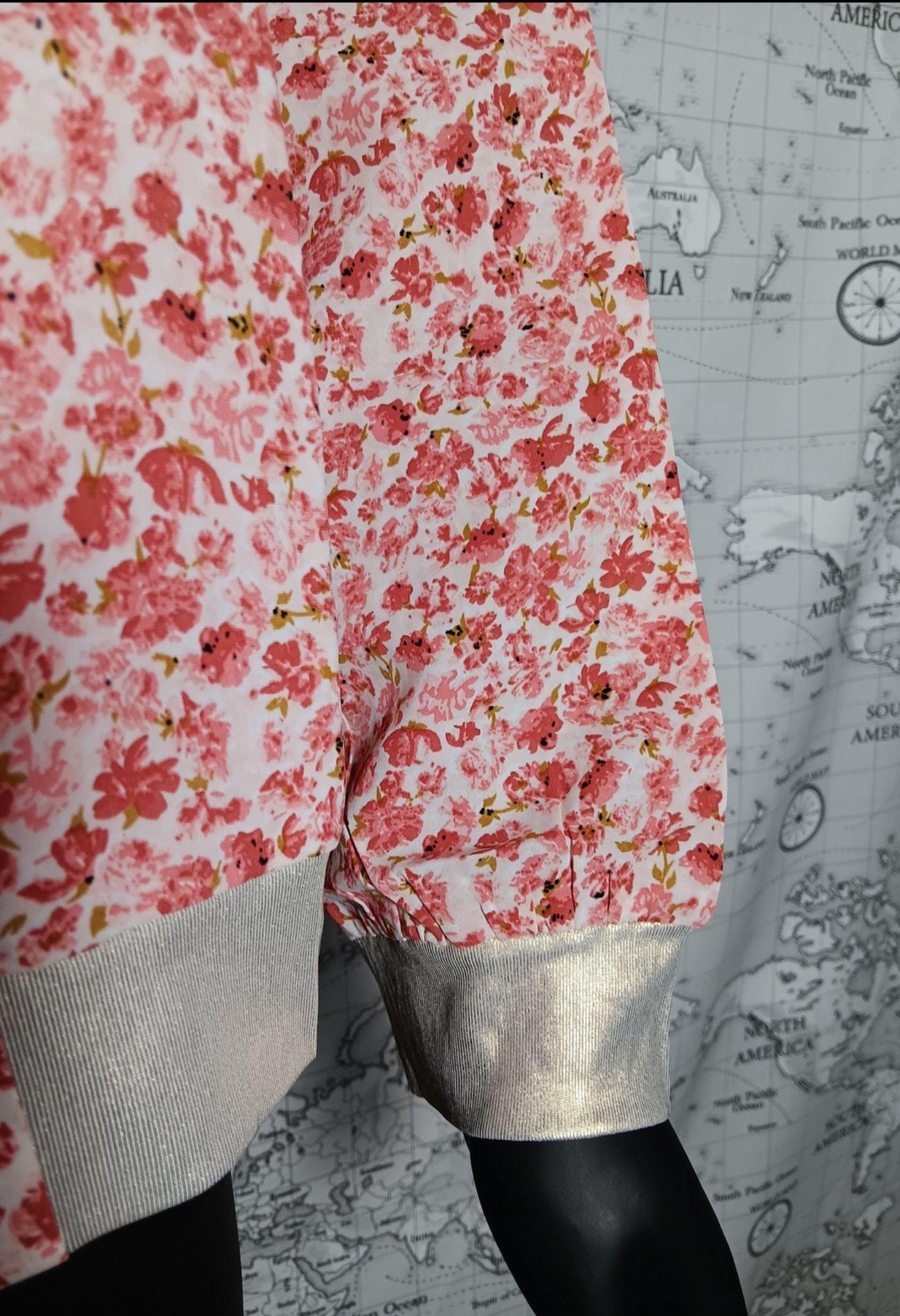 Red-orange floral bomber jacket Le Petit Placard with metallic cuffs, world map backdrop