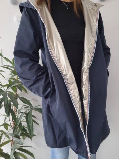 Woman wearing Laura Jo navy raincoat with metallic lining, Le Petit Placard fashion