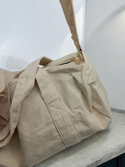 Sac polochon en velours côtelé beige - Le Petit Placard