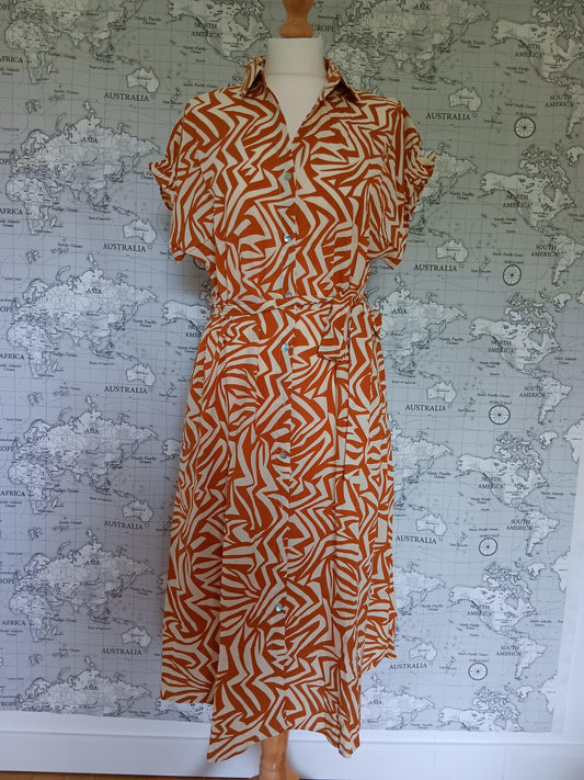 Robes longues à motifs orangés - Le Petit Placard